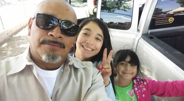 Natalie takes selfie with her dad and sister