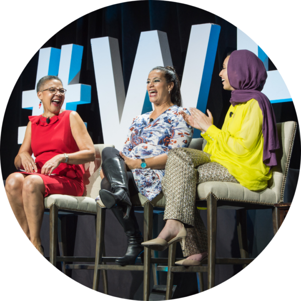 Lauren Y. Casteel, Maysoon Zayid, & Noor Tagouri laugh together onstage at 2019 Annual Luncheon